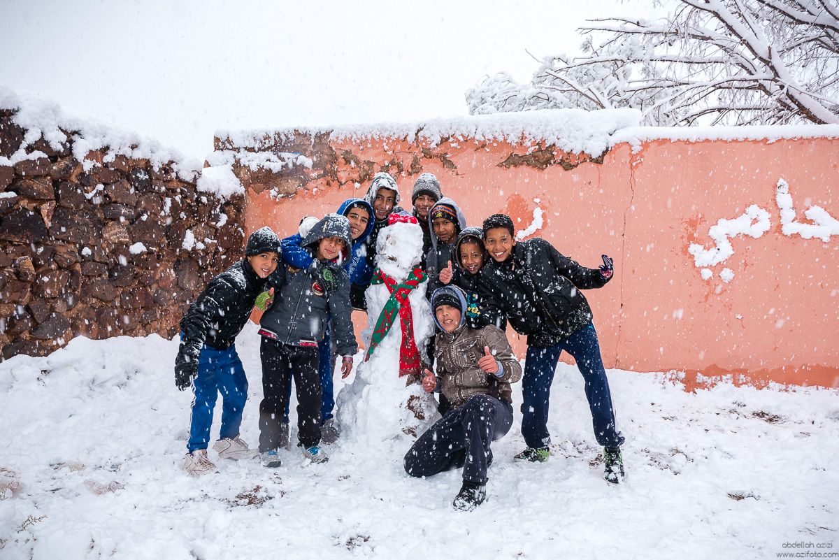 Group photo with snow man Ouarzazate, Morocco