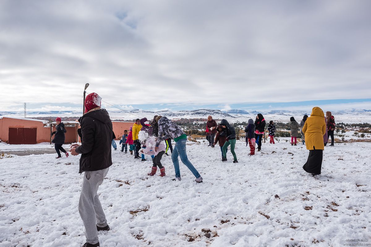 Playing with snow, Ouarzazate, Morocco